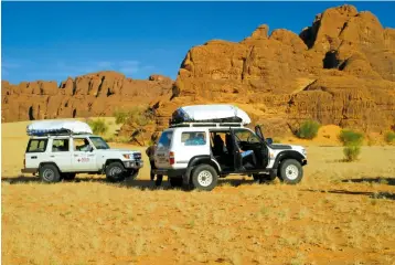  ??  ?? A road trip through the Ennedi Plateau in Chad takes in glorious sandstone mountains and remote settlement­s