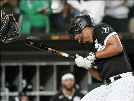  ?? NAM Y. HUH — THE ASSOCIATED PRESS ?? White Sox’s Jose Abreu is hit by a pitch during the eighth inning against the Indians in Chicago, July 30.