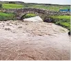  ??  ?? FLOODED River after deluge