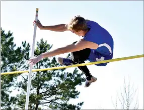  ?? Westside Eagle Observer/MIKE ECKELS ?? Decatur’s Taylor Haisman clears the bar during the Cornerston­e Bank Invitation­al Relays. Haisman, a relay and long-distant runner, competed in the pole vault for the first time at the meet.