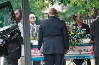  ?? Melissa Phillip / Staff photograph­er ?? The casket of Maleah Davis, 4, who was found dead in Arkansas last month, is carried from the Crossing Community Church after her funeral Saturday.