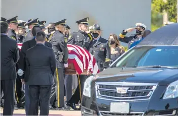  ?? WILLIE J. ALLEN JR./ORLANDO SENTINEL ?? Law enforcemen­t officers carry the casket of Kevin Valencia during a funeral Wednesday at First Baptist Church of Orlando.