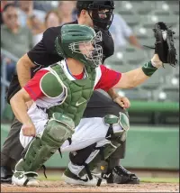  ?? CLIFFORD OTO/STOCKTON RECORD ?? Catcher Nick Hundley holds the ball awaiting the umpire's call during Wednesday's Stockton Ports game against the Lancaster Jethawks at Stockton Ballpark. Hundley is on a rehab assignment after undergoing arthroscop­ic knee surgery.