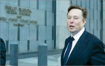  ?? ?? Elon Musk leaves the Phillip Burton Federal Building and United States Court House in San Francisco on Tuesday.