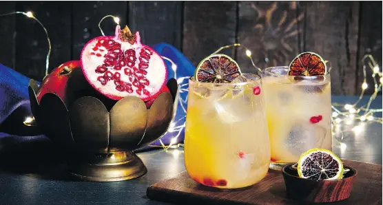  ??  ?? Bacardi’s Season’s Greetings is one of many drinks that can be concocted for some holiday cheer. It includes Bacardi Cuatro, honey, lime juice, white cranberry juice and pomegranat­e seeds.