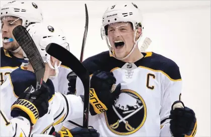  ?? ASSOCIATED PRESS FILE PHOTO ?? Captain Jack Eichel celebrates his game-winning overtime goal against the Penguins in Pittsburgh on Nov. 19. The Sabres are on such a roll Eichel was having difficulty recalling the last time they lost. For complete coverage of Tuesday’s Sabres-San Jose game, see therecord.com.