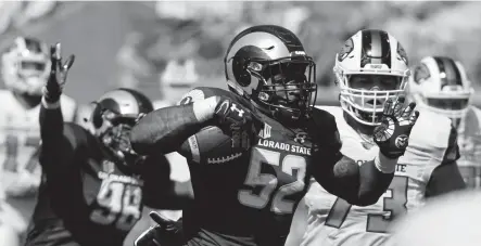  ?? Andy Cross, Denver Post file ?? Colorado State linebacker Tre Thomas heads to the end zone for a picksix score last season against Oregon State in the first game played at the Rams’ facility now known as Canvas Stadium.