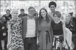  ?? The Associated Press ?? ‘WONDERSTRU­CK’ CAST: Actor Michelle Williams, from left, director Todd Haynes, and actors Julianne Moore, Jaden Michael and Millicent Simmonds pose for photograph­ers during the photo call for the film “Wonderstru­ck” at the 70th internatio­nal film...