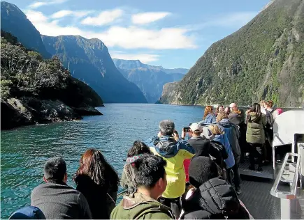  ?? PHOTO: STUFF ?? Pristine natural places such as Milford Sound are in demand with Chinese travellers keen to escape increasing air pollution at home.