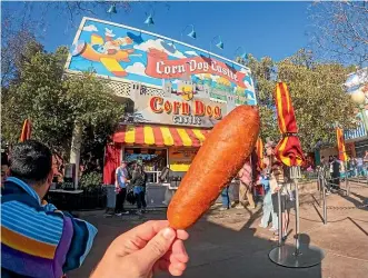  ?? STEPHEN HEARD/ STUFF ?? Michelin-star dishes are all very well, but a sauceless corn dog at Disneyland in California can be equally as satisfying.