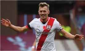  ??  ?? James Ward-Prowse celebrates scoring his second free-kick goal of the game to put Southampto­n 3-0 up at Aston Villa. Photograph: Gareth Copley/EPA