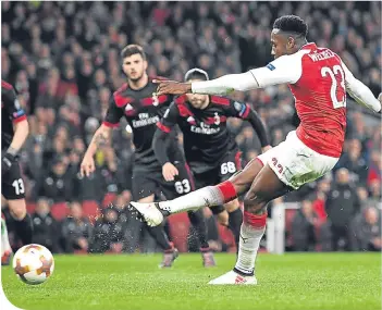  ??  ?? Danny Welbeck scores from the spot against AC Milan last month