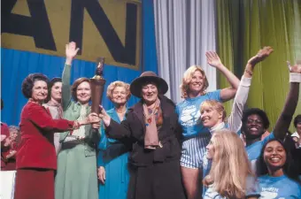  ??  ?? First Ladies Lady Bird Johnson, Rosalynn Carter, and Betty Ford, Internatio­nal Women’s Year presiding officer Bella Abzug, and Torch of Freedom relay runners at the opening ceremonies of the National Women’s Conference, Houston, November 1977