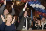  ?? MICHAEL GREENLAR/THE SYRACUSE NEWSPAPERS VIA AP ?? Ben Walsh, who ran on the Independen­ce and Reform party lines, thanks supporters after winning the the race for Syracuse mayor, Tuesday, Nov. 7, 2017, in Syracuse, N.Y. Walsh’s wife, Lindsey, is at front left.