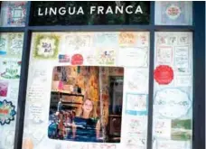  ??  ?? Textile artist Diana Weymar poses for a picture next to her “Tiny Pricks” project at Lingua Franca store during an interview with AFP in New York City.