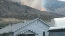  ?? TWITTER ?? Winds pushed flames to within 15 metres of the Church & State Wines property in B. C.’ s Southern Okanagan Valley.