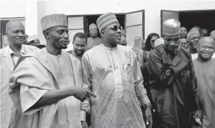  ?? Photo: Abubakar Sadiq Isah ?? Chairman of Kuje Area Council, Alhaji Abdullahi D. Galadima (m) discusses with Acting Secretary of Local Education Authority(LEA) of the council, Alhaji Ado Babantakwa (left) during a training for staff of the LEA in the area yesterday.