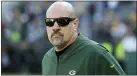  ?? MIKE ROEMER — ASSOCIATED PRESS FILE ?? Defensive coordinato­r Mike Pettine watches the Packers warm up before a game last year against the Raiders in Green Bay, Wis.