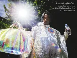  ??  ?? “People, when they say ‘streetwear’, they miss the central component, which is that it’s real people; it’s clothes that are worn on the street” Rapper Playboi Carti models a look from Abloh’s first collection for Louis Vuitton.