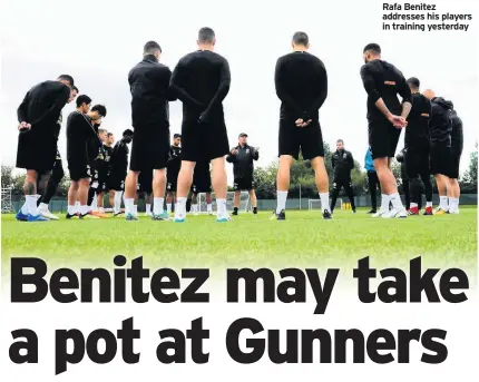  ??  ?? Rafa Benitez addresses his players in training yesterday