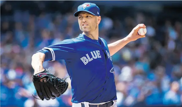  ?? NATHAN DENETTE / THE CANADIAN PRESS ?? Toronto Blue Jays starting pitcher J.A. Happ bears down Wednesday in pursuit of his first complete game since 2010.