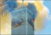  ?? (AP/David Karp) ?? Fire and smoke billows from the north tower of New York’s World Trade Center on Sept. 11, 2001.