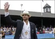  ?? ELISE AMENDOLA - THE ASSOCIATED PRESS ?? FILE - In this July 22, 2017, file photo, Tennis Hall of Fame inductee Andy Roddick walks around center court to acknowledg­e fans during enshrineme­nt ceremonies at the Internatio­nal Tennis Hall of Fame, in Newport, R.I.