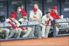  ?? MIKE CARLSON — THE ASSOCIATED PRESS ?? It’s a collective look of dejection in the Phillies dugout after a 5-0 loss to the Tampa Bay Rays ended any hopes of making the playoffs.