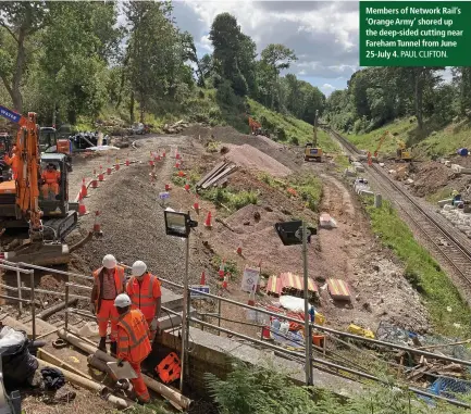  ?? PAUL CLIFTON. ?? Members of Network Rail’s ‘Orange Army’ shored up the deep-sided cutting near Fareham Tunnel from June 25-July 4.