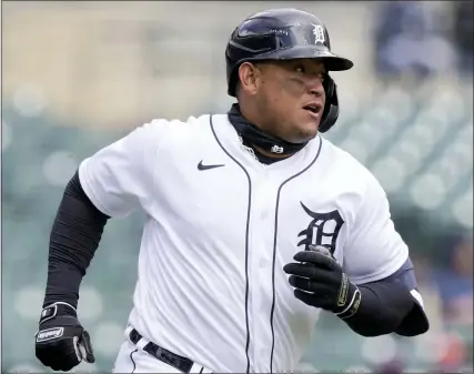  ?? PHOTOS BY CARLOS OSORIO — THE ASSOCIATED PRESS ?? Detroit Tigers’ Miguel Cabrera runs to first during the third inning of Thursday’s game against the Cleveland Indians in Detroit.