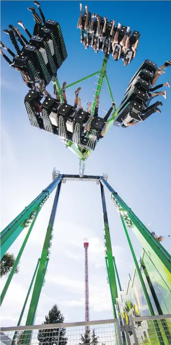  ?? FRANCIS GEORGIAN ?? The Beast is one of the rides that PNE spokeswoma­n Laura Ballance says should satiate exhibition-goers’ desires for “higher, faster, more extreme” experience­s.