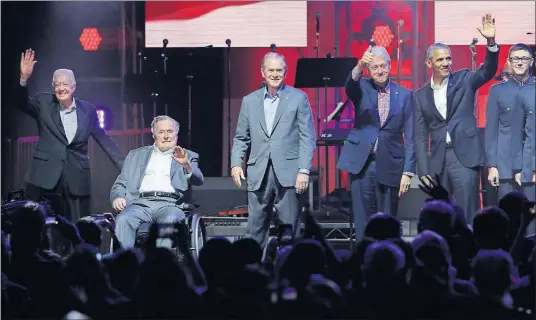  ?? [LM OTERO/THE ASSOCIATED PRESS] ?? Former presidents, from left: Jimmy Carter, George H.W. Bush, George W. Bush, Bill Clinton and Barack Obama gather on stage at the opening of a hurricane relief concert in College Station, Texas. The five have helped raise $31 million so far for relief...