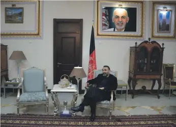  ?? AFP ?? Atta Noor in his office in Mazar-i-Sharif. The former governor of the northern province of Balkh is refusing to step down after Mr Ghani effectivel­y sacked him in December