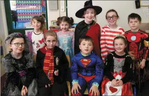  ?? Photos by Sheila Fitzgerald. ?? RIGHT: Children from first and second classes at Boherbue National School looking the part during World Book Day.