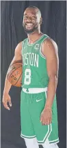  ?? BRIAN BABINEAU GETTY IMAGES ?? Boston Celtics guard Kemba Walker is listed at six-feet-one, but is probably shorter.