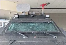  ?? City of Boulder / Courtesy photo ?? The Boulder Police Department's Armored Rescue Vehicle's front window was shattered during the riot on Saturday. The vehicle also was dented in several places and other side windows were shattered.