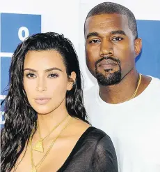 ?? WENN ?? Kim Kardashian, left, and Kanye West are reportedly expecting a fourth child using the same surrogate who carried their third baby.