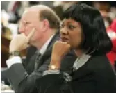  ?? RIC FELD — THE ASSOCIATED PRESS FILE ?? Minority Whip Carolyn Fleming Hugley, D-Columbus, right, and Minority Leader DuBose Porter, D-Dublin, left, attend a meeting at the Capitol in Atlanta.