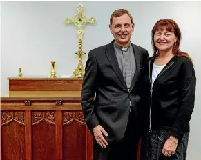  ??  ?? Peter Carrell with his wife Teresa Kundycki-Carrell after he was officially made bishop-elect yesterday.