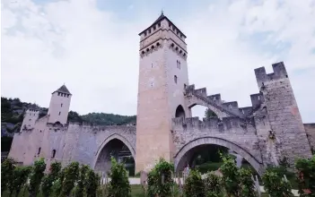  ?? PHOTOS: JIM BYERS ?? Pont Velantré is a stunning stone bridge in Cahors, France, an Instagram-worthy city that attracts outdoor enthusiast­s, as well as wine lovers and foodies.