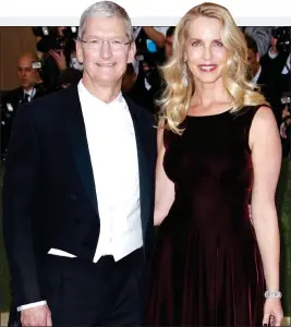  ?? ?? ‘RED FLAG’: Apple’s Tim Cook, with Laurene Powell Jobs, its founder’s widow