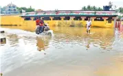  ??  ?? A temple engulfed by water in Rameswaram on Monday