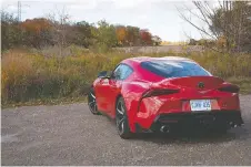  ??  ?? Dramatic styling of the Supra gives the rear cargo opening an odd shape.