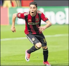  ?? MIGUEL MARTINEZ/ MUNDO HISPANICO ?? Miguel Almiron celebrates after scoring Atlanta United’s first goal in the first half against NYCFC. He followed with a second goal later Sunday.