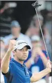  ?? Adam Hunger Associated Press ?? JASON DAY reacts after winning the Barclays by six shots over Henrik Stenson.