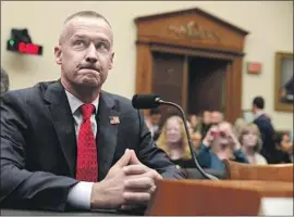  ?? Alex Wong Getty Images ?? FORMER Trump aide Corey Lewandowsk­i told the House hearing that the White House had directed him not to disclose his discussion­s with the president.