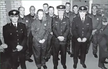  ?? 01_B42twe02 ?? Corriecrav­ie fire crew in their newly opened station with mainland officers, assistant firemaster David Kennedy, firemaster John Jameson and assistant firemaster John Martin. Crew: leader Angus Adamson, Alastair Linton, Angela McNeish, Grant McAllister, Charlie McAllister, Matthew McNeish, John Taylor, Robin Cook and Alastair Barr.