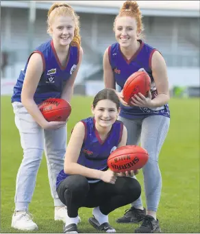  ?? Picture: PAUL CARRACHER ?? PREPARATIO­N: Horsham Demons footballer­s, from left, Ashlee Ison, Greta Arnel and Hailey Puls are back training with fingers crossed the Western Victoria Female Football League under-18 grand final will go ahead in early October.