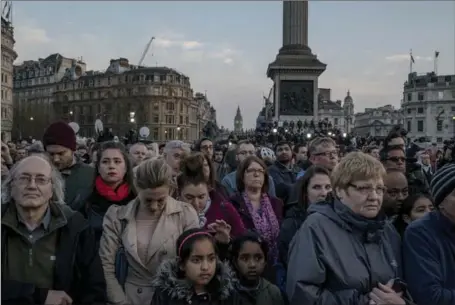  ?? ANDREW TESTA, NEW YORK TIMES ?? A vigil was held in Trafalgar Square Thursday for those killed in Wednesday’s attack outside the houses of Parliament in London. The attack by a 52-year-old U.K.-born man left five people dead, including the attacker.