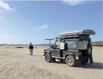  ??  ?? This page: The white sandy beaches in this part of Ireland allowed for all sorts of sea-borne activities